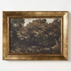 a painting hanging on the wall in front of a white wall with a gold frame