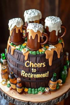 a cake made to look like a barrel with beer mugs on top that says cheers to retirement