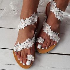 Category:Wedding Shoes,Sandals; Upper Materials:PU Leather; Embellishment:Flower,Rhinestone; Season:Summer; Heel Type:Flat Heel; Gender:Women's; Toe Shape:Open Toe; Style:Sweet,Classic; Heel Height(inch):<1; Outsole Materials:Rubber; Occasion:Daily,Wedding; Closure Type:Loafer; Pattern:Solid Colored,Floral; Listing Date:08/31/2022; Production mode:External procurement; 2023 Trends:Plus Size,Flat Sandals,Boho Bohemia Beach; Foot Length:; Foot Width:; SizeChart1_ID:2:179956; Size chart date source White Lace Flats, Wedding Shoes Sandals, Beaded Flip Flops, Beach Wedding Shoes, Pearl Sandals, Wedding Shoes Lace, Lace Flats, Roman Sandals, Flower Sandals