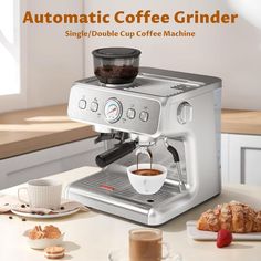 an automatic coffee grinder sitting on top of a counter