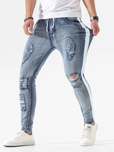 Details:Side Stripe \nDetails:Ripped \nClosure Type:Zipper Fly \nColor:Light Wash \nPattern Type:Colorblock \nType:Skinny \nWaist Line:Natural \nLength:Long \nFit Type:Regular Fit \nFabric:Slight Stretch \nMaterial:Denim \nComposition:76% Cotton \nComposition:22% Polyester \nComposition:2% Elastane \nCare Instructions:Machine wash, do not dry clean \nBody:Unlined \nSheer:No \n Side Ripped Jeans, Ripped Jeans Men, Side Stripe, Ripped Jeans, Panel Siding, Color Blocking, Mens Jeans, Siding, Dry Clean