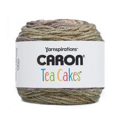 yarn that is brown and green with the words'caron tea cakes'on it