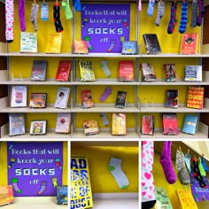 there are many books and socks on the shelves