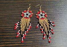 These beautiful Huichol Hand Beaded Fringe Earrings are sure to please. Perfect for that boho style or hippie jewelry. These earrings are for display only. Your earrings will be made to order in the colors of your choice. It usually takes 2-4 days to complete a pair of earrings, but Christmas rush may extend that time by a day or two. ❤ SIZE & DETAILS ♡ Hooks are 22k gold plated fish hook wire. (Hooks can be swapped between silvertone metal fish hook wires, silvertone clip-on or 22k gold plated Red Bohemian Beaded Earrings With Gold Beads, Bohemian Red Beaded Earrings With Gold Beads, Handmade Beaded Earrings For Festivals, Handmade Round Beaded Earrings For Festivals, Bohemian Round Beads Earrings For Festivals, Handmade Bohemian Beaded Earrings For Festive Occasions, Traditional Jewelry Beaded Fringe For Jewelry Making, Festival Earrings With Gold Beads, Traditional Gold Beaded Earrings As Gift