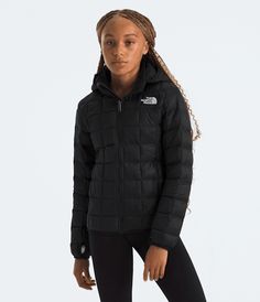 The Girls’ ThermoBall™ Hooded Jacket delivers lightweight, packable warmth for variable weather conditions. A removable hood, secure-zip pockets, and a drop tail hem are perfect for the playground, backyard or trail. We’ve updated our youth sizing. Please use our sizing guide to find your best fit. Kids' Girls' Jackets and Vests. Packable.. Hooded.. .. Lightweight. [North Face, Northface, thenorthface, the northface, TNF, tnf] Functional Hooded Puffer Jacket By The North Face, North Face Black Puffer Jacket, Playground Backyard, The North Face Puffer Jacket, The North Face Puffer, North Face Puffer Jacket, Fit Kids, Black Puffer, Black North Face