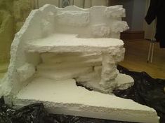 a large white sculpture sitting on top of a table