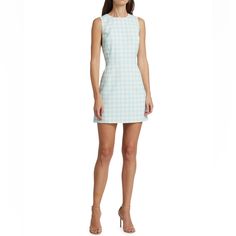 Alice And Olivia Clyde Houndstooth Sheath Dress Size 6 Only At Saks. This Charming Alice + Olivia Clyde Sheath Dress Boasts A Bright Houndstooth Pattern. Cut With A Crewneck, This Style Boasts A Sleeveless Silhouette. Crewneck Sleeveless Back Zip Closure 100% Polyester Dry Clean Imported Size & Fit About 33" From Shoulder To Hem Model Measurements: 5'10" Tall Model Is Wearing A Us Size 4 Nwt. Perfect Condition. Chic Sleeveless Mini Dress With Houndstooth Pattern, Fitted Sleeveless Houndstooth Mini Dress, Fitted Sleeveless Mini Dress With Houndstooth Pattern, Fitted Plaid Tweed Dress For Summer, Fitted White Mini Dress With Houndstooth Pattern, Chic Gingham A-line Dress, Fitted Mini Dress With Houndstooth Pattern, Fitted Gingham Knee-length Mini Dress, Fitted White Houndstooth Mini Dress