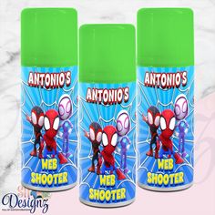 three bottles of spider - man's web shooter deodorant