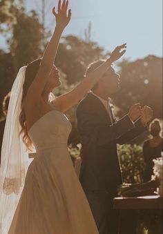 the bride and groom are dancing at their wedding