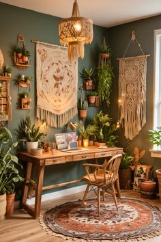 a room with green walls and plants on the wall next to a wooden desk in front of a window