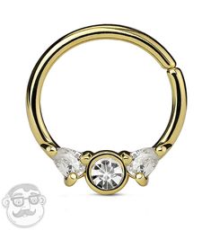 a gold nose ring with three clear stones