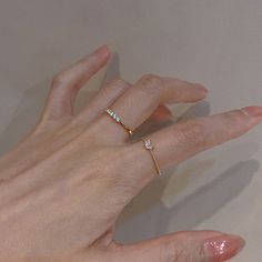 ✦ This luxurious ring set features a delicate layer with a gold heart CZ ring and a second layer adorned with a thin gold ring inlaid with CZ stones. Both layers exude a minimal and charming appeal, making it the perfect romantic gift for a special woman. The versatile design allows for single-layer wear, while the stacked layers create a dainty and elegant look with distinct vibrancy. ----------- DETAILS ----------- *Sold as set - Color: Gold/ White Gold - Size: Adjustable up to US6-US7 - Mater Finger Ring Design, Index Finger Rings, Knuckle Ring, Gold Ring Sets, Rhinestone Ring, Tiny Heart, Finger Rings, Rings For Girls, Cute Rings