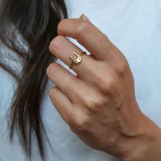 Introducing our Lucky Horseshoe Ring—a symbol of good luck and protection. Crafted from 18K Gold-Filled, this exquisite ring features a horseshoe design, a timeless symbol of fortune. Wear it as a personal talisman or a fashionable accessory, and invite positive energy into your life. Embrace the power of luck with our Lucky Horseshoe Ring and elevate your style with a touch of enchantment. Please note: To ensure the longevity of your jewelry, we suggest to remove when showering, working out, and cleaning, and avoiding any lotion or perfumes directly on it. 14k Yellow Gold Horseshoe Jewelry, Elegant Horseshoe Rings For Gifts, 14-karat Yellow Gold Horseshoe Jewelry, Yellow Gold Horseshoe Jewelry For Anniversary, Gold Horseshoe Jewelry For Anniversary, Elegant Yellow Gold Horseshoe Rings, Adjustable Gold Horseshoe Jewelry, Horseshoe-shaped Yellow Gold Jewelry Gift, Horseshoe Shaped Yellow Gold Jewelry Gift