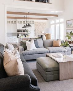 great room, living room, family room, great room inspo, living room inspo, family room inspo, great room decor, living room decor, family room decor, great room ideas, living room ideas, family room ideas, grey sofa, gray sofa, grey couch, gray couch, ottoman, coffee table, open floor plan, neutral tones, bright home, new home, beautiful home, dream home, traditional home, farmhouse decor, farmhouse design, Great Room Design, Dream Family Room, Havenly Living Room, Project Portfolio, Living Room Side Table, Storage Design, Interior Design Companies, Apartment Inspiration, Great Room