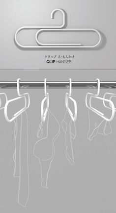 clothes hangers with clips hanging from them