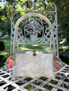 "Thank You If You Favored One of My Items! You Will Receive 10% Off an Item of Your Choice, Unless It Is On Sale, Code17. Thank You. RARE LUCITE Handbags/Lucite Bags/50's Lucite Handbags/Unique Lucite Purses/50's Handbag/Vintage Lucite PursesNear MINT Condition Circa 1950's RARE Lucite Handbag These Coffin Lucite Handbags are very Rare.  Sometimes they are called Wedding Handbags.  This one is particularly Rare because Flowers are on the Ends rather than the Top.  Most often you see them done in White Satchel Box Bag For Party, White Rectangular Satchel For Party, Retro Handheld Box Bag, Vintage Rectangular Box Bag For Party, Retro Handheld Bags As Gifts, Retro Handheld Bag As Gift, White Clutch Box Bag With Top Carry Handle, Retro Handheld Bag As A Gift, Classic Bag With Pearl Handle And Rectangular Shape