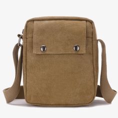 This Stylish Men's Canvas Messenger Bag is a crossbody casual bag that can be handy and has multiple functions. It can serve as a mini travel bag, a tool bag, or an everyday work or school bag. This simple but stylish bag has room for a tablet, books, mobile phones, car keys, credit cards and many other everyday essentials. This bag will also make a great gift for any hardworking man you know! Features: Long adjustable shoulder strap Multiple sized pockets available Measures 20cm x 23cm x 9cm Bu Casual Portable Shoulder Bag For Everyday Carry, Casual Rectangular Everyday Carry Bags, Casual Everyday Carry Rectangular Bag, Daily Use Shoulder Satchel, Casual Crossbody Satchel For Everyday Carry, Casual Shoulder Bag With Adjustable Strap For Everyday, Portable Rectangular Bag For Everyday Carry, Practical Rectangular Chest Bag, Practical Everyday Rectangular Chest Bag