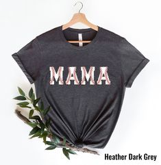 Cute Baseball Mama Shirt, Mothers day Gift For Baseball Mom, Gift For Baseball Lover Mom Shirt, Mothers Day Shirt, Baseball Season Mom Shirt Welcome to AuroraConceptDesign! ❤️ 👉🏻 PROCESSING TIME: - 3-5 business days. - Please contact with us if there is a rush order. 👉🏻 DELIVERY TIME: - Standard Shipping:  3-5 business days - Expedited Shipping  1-3 business days 👉🏻 CARE INSTRUCTIONS: - Machine wash cold and tumble dry low.  - Do not iron directly onto the design. - Do not bleach. We offer Short Sleeve Tops With Lettering For Mother's Day, Mother's Day Cotton Tops With Lettering, Thanksgiving Mom, Gifts For Baseball Lovers, Thankful Mama, Mama Tshirts, Baseball Mama, Birthday Mom, Mama Tee