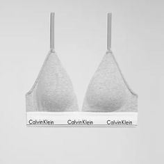 Brand New With Tags! Size Large Fits 34d, 36c, 38b Or Size Xl Fits 40c, 38d, 36dd A Calvin Klein Icon. This Modern Cotton Bralette Is The Definition Of Effortless. Made With Super Soft And Supple Cotton Stretch Blended With Modal For All Day Comfort. Designed With The Original Calvin Klein Logo Band, This Is A Sporty Look That Feels Sexy Everyday. Lightly Lined Triangle Cups For Delicate Support And A Lightweight, Breathable Feel. Cushioned Hook And Eye Back Closure For A Custom Fit. Soft, Flexi Casual Loungewear Bra, Cotton Fitted Bra For Loungewear, Cotton Daywear Bra, V-neck Bra For Loungewear, Ck Grey Bra, Calvin Klein Bra And Under Set Grey, Calvin Klein Seamless Fitted Bra, Calvin Klein Fitted Sports Bra, Fitted Calvin Klein Summer Bra