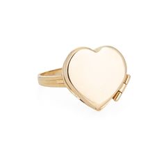 "Stylish picture locket ring crafted in 14 karat yellow gold.  The heart shaped ring is a wonderful sentimental piece. The locket opens to reveal two sections that can accommodate a picture or keepsake. The low rise ring (5mm - 0.19 inches) sits comfortably on the finger. The ring is in very good condition and was recently professionally cleaned and polished.  Particulars: Weight: 3.3 grams Stones:  N/A  Size & Measurements: The ring is a size 7 (sizable). The mount measures 15mm diameter (0.59 Stylish Picture, Masonic Jewelry, Russian Jewelry, Heart Shaped Ring, Opal Diamond Ring, Locket Ring, Antique Jewelry Rings, Picture Locket, Gold Heart Ring