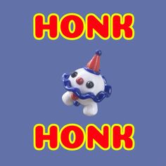 a plastic toy with the words honk honk written in red and blue on it