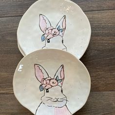 two plates with bunny ears painted on them