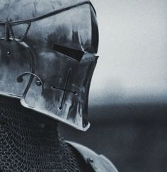 a close up view of a knight's helmet