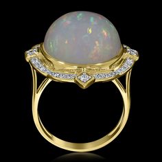 This ring is designed with 14k yellow gold and creatively set with round cut Opal and round Diamonds. Product Information SKU J17707 Metal Type 14K Metal Color Yellow Gold Ring Style Fancy Metal Weight 4.7 Primary Stone Gemstone Name Opal No. Of Gemstones 1 Gemstone Shape Round Gemstone Weight 10.54 Gemstone Treatment - Secondary Stone Gemstone Name Diamond Gemstone Shape Round Gemstone Color - Gemstone Grade - Gemstone Clarity - Gemstone Weight 0.3 Ring Style, Opal Ring, Yellow Gold Ring, Opal Rings, Metal Color, Diamond Gemstone, Yellow Gold Rings, Gemstone Colors, Yellow Color