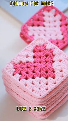 two pink crocheted squares sitting next to each other on a white surface with the words follow for more like & save