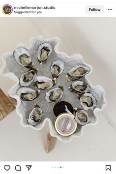 there is a bowl with oysters in it