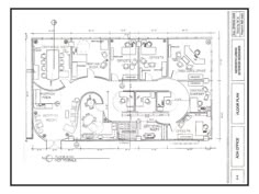 the floor plan for an office with two desks and three chairs, one on each side