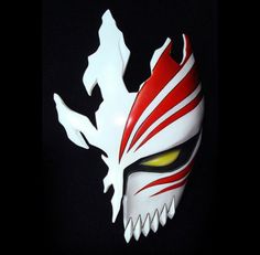 a white mask with red and yellow eyes on top of a black background that says hello cosplay