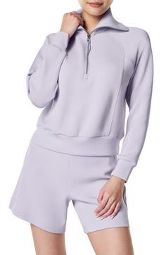 A modal-enhanced blend adds comfort to a half-zip sweatshirt styled with a stand collar and slightly split cuffs. 21 1/2" length (size Medium) Stand collar Long sleeves 47% modal, 46% polyester, 7% elastane Dry clean or machine wash, tumble dry Imported Versatile Half-zip Sweatshirt With Ribbed Cuffs, Half-zip Athleisure Activewear For Loungewear, Athleisure Half-zip Sweatshirt For Loungewear, Half-zip Loungewear Sweatshirt In Sportswear Style, Half-zip Sportswear Sweatshirt For Loungewear, Sportswear Half-zip Loungewear Sweatshirt, Relaxed Fit Sportswear Top With Half-zip, Sportswear Half-zip Tops With Relaxed Fit, Spring Half-zip Athleisure Sweatshirt