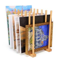 PRICES MAY VARY. Functional: This is a perfect art rack for storing art canvas. Sturdy: The art canvas storage rack is made of beech wood and painted with varnish, looks beautiful. Good Solution for Large Art Work: Canvas rack art storage can storage big size canvas art work, around 20 inches size. Easy to Assemble: The dowel for canvas storage fits tight, the dowel has two sides, one side fits well, you can use a hammer to hold it in place, if you want more stability you can use screws. Suitabl Art Canvas Storage, Large Art Work, Art Rack, Artwork Storage, Art Studio Storage, Artist Workspace, Studio Storage, Art Supply Organization, Board Storage