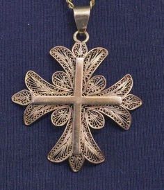 "Presented here is Solid 18K Filigree Cross Pendant which dates from the last days of the 19th century The cross pendant is hallmarked with the Owl which is the French Hallmark for certified 18 Carat Gold of mom French Origin. This very fine work is typical of Portugal and the Owl hallmark is the French guarantee for 18 Carat. It is rare to find such perfect filigree work in 18 K solid gold and in perfect and pristine condition It is a very fine and nice item to wear. It is a large item. Dimensi Traditional Jewelry With Historical Design For Collectors, Elegant Ceremonial Cross Necklace, Traditional Medallion Jewelry With Historical Design, Traditional Gold Crucifix Jewelry, Intricate Crucifix Necklace As A Gift, Intricate Crucifix Necklace For Gift, Crucifix Necklace With Intricate Design For Gifts, Ceremonial Historical Pendant Jewelry, Ceremonial Historical Design Pendant Jewelry