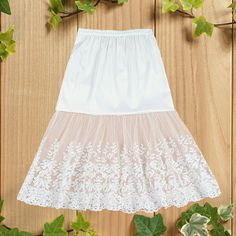 Why we <3 it! Summer Wedding Skirt With Stretch, White Stretch Tulle Skirt Bottoms, White Stretch Tulle Bottoms, Summer Wedding Pleated Skirt, Spring Wedding Gathered Skirt, Spring Pleated Stretch Petticoat, Stretch Tulle Mini Skirt For Summer, Summer Stretch Tulle Mini Skirt, Stretch Summer Tulle Petticoat