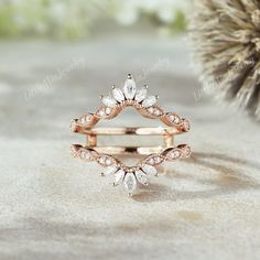 an image of a ring with diamonds on it