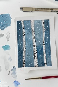 watercolors and paint are used to create an art project with birch trees in the snow