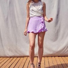 Lavender Ruffle Side-Wrap-Around Tie Skort: Small - Do Be Boutique Brand - New W/ Tags - Never Worn - No Flaws - Elastic Back Waistband - Ruffled Bottom - Skirt / Shorts + Built-In Shorts - 50% Cotton / 50% Poly - Lining: 97% Poly / 3% Spandex Approx Flat Lay Measurements: - Waist: 12” - Length: 13” Summer Skort - Casual Skirt - Grape Color - Nwt Purple Skort, Summer Skort, Grape Color, Wrap Shorts, Skirt Shorts, Boutique Brands, Casual Skirt, Skorts, Wrap Around