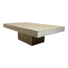 a concrete table with a square base on it's end, against a white background