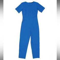 Brand New Without Tags Size 2p In Blue Model Photos Are To Show Style And Fit Only. See Photos Of Actual Garment For True Color. The Lee Jumpsuit From Ilana Kohn Is A Timeless, Chic, And Effortless Onesie In Exclusive Petite Sizing. A Fitted Jumpsuit With A Scoop Neck, Defined Waist, Short Sleeves, Zip Closure At Back And Straight Legs In Blue Heavyweight Cotton Twill. Pull-On Style With Back Zip Closure 100% Cotton Machine Wash Cold Made In The Usa 2p: Chest = 34", Waist = 28.5", Hips = 36", To Ilana Kohn, Defined Waist, Blue Jumpsuit, Timeless Chic, Fitted Jumpsuit, Blue Jumpsuits, Model Photos, Cotton Twill, Pant Jumpsuit