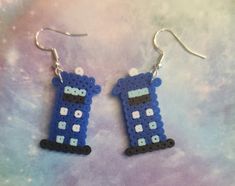 Doctor Who earrings great for that Doctor Who fan in your life.  Please message with any questions.  :) Perler Bead Earrings, Safety Pin Jewelry, Beads Patterns, Jewelry Beads, Beaded Jewelry Patterns, Pin Jewelry, Perler Bead, Dr Who, Bead Earrings