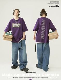 two people wearing headphones are standing in front of a white background and one is holding a cardboard box