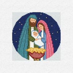 a cross stitch christmas card with the image of jesus and mary holding a baby jesus