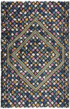 an old rug with multicolored squares and diamonds on the bottom, in various colors