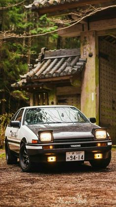 a car parked in front of a house