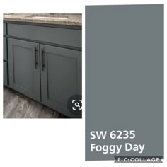 a bathroom with gray cabinets and marble counter tops in the same color as the walls