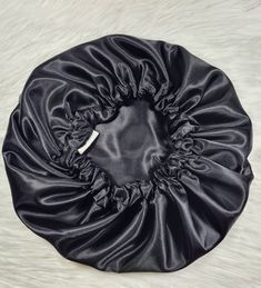 Our beautiful silky-smooth reversible satin hair Bonnet is handmade with  Premium quality satin fabric. Great way to protect your hairstyle day time and night. Very comfortable to wear made with 100% polyester Ideal for night sleep and to protect hairstyle. PLEASE NOTE: WE ARE SO CONFIDENT IN OUR PRODUCT, 30 DAYS MONEY BACK GUARANTEE  Small size: 21 inches (elastic) Medium size: 21 inches (elastic)  Larger size: 21 inches (elastic) Our Bonnet Sizing Guide for your comfort. SMALL Short hairstyle Cornrows Afro Short natural hair MEDIUM Shoulder length hair Crochet hairstyle Medium afro hairstyle Mid-length back hair LARGE Long braids Long natural hairstyle Thick volumised hair Thick hairstyle If you require different sizes than what we have listed above. Send us a message with your order and Satin Hair Bonnet, Sleep Hat, Silk Bonnet, Ghana Braids, Satin Bonnet, Hair Bonnet, Shower Caps, Your Hairstyle, Braids For Black Women