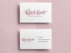 two white business cards with pink ink on the front and back, one is for photographer