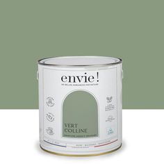 a can of green paint with the words envie painted on it's side